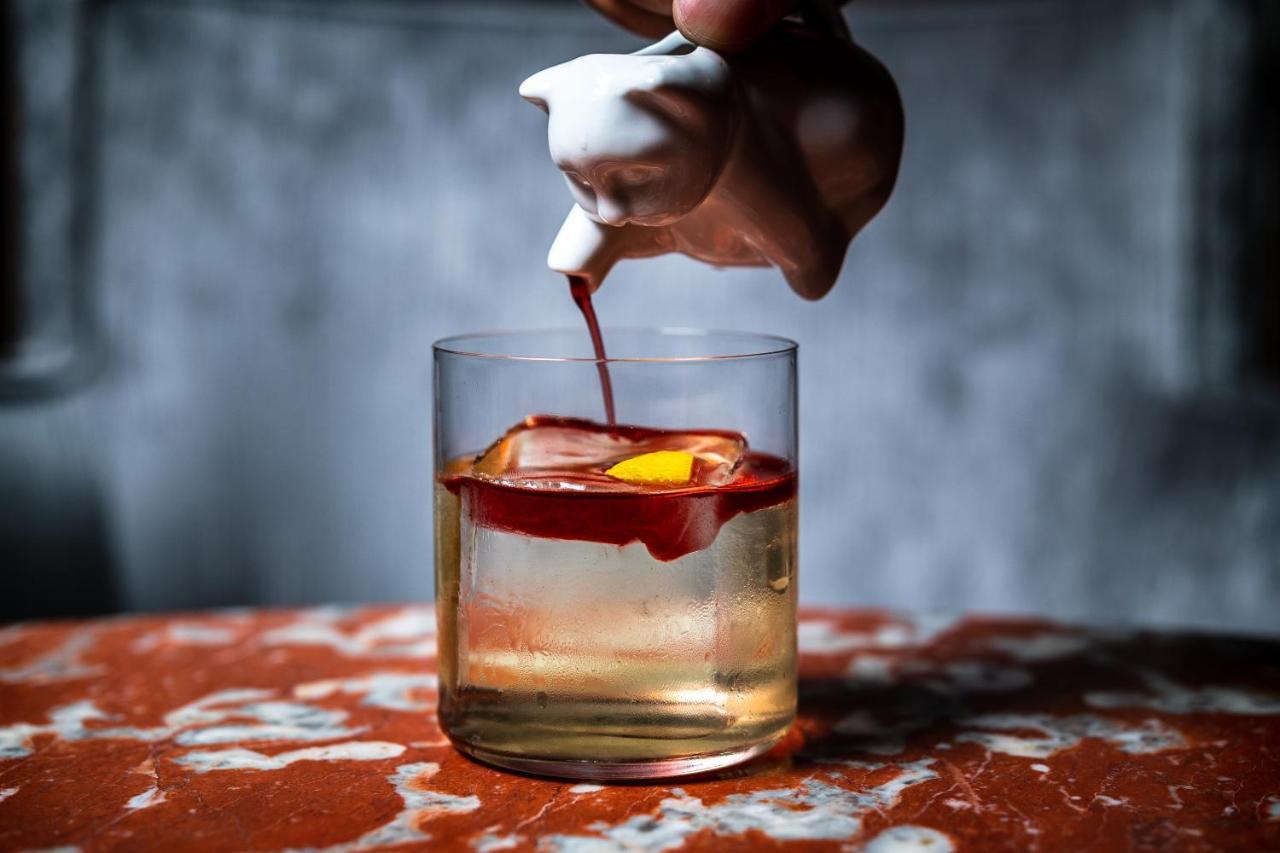 Riggs Washington Dc Hotell Exteriör bild A classic Old Fashioned cocktail being garnished with a cherry